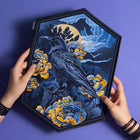 A person holds the Crow & Peonies Embroidered Back Patch, a hexagonal patch featuring a gothic raven among yellow and blue peonies, dramatic clouds, and a full moon, all shown on a purple surface.