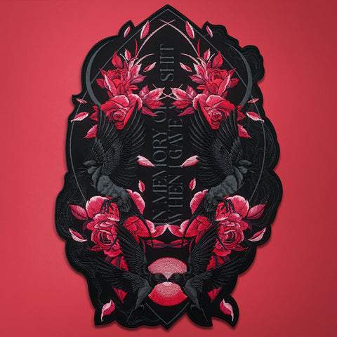 The Swallows And Flowers Custom Embroidered Patch features red roses, two black birds, and "IN MEMORY OF A SHIT I ONCE GAVE" on black—an ideal bold gift or way to display your favorite custom quote.