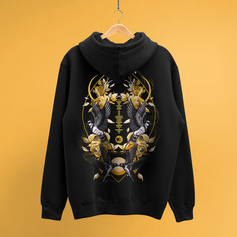 A Custom Song Code Unisex Embroidered Hoodie hangs on a wooden hanger against a yellow background, showcasing an intricate back graphic with mirrored hands, yellow roses, geometric shapes, and abstract elements.