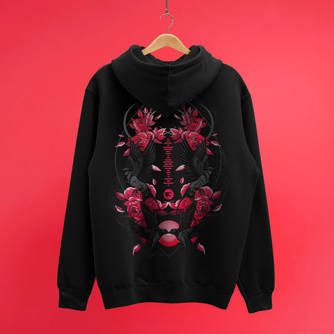 The Custom Song Code Unisex Embroidered Hoodie, shown in black on a wooden hanger against a red background, features an intricate back design with red roses, black birds, geometric patterns, and pink accents.