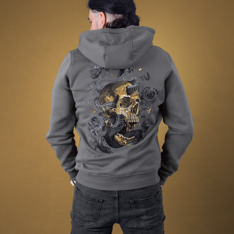 A person with long dark hair wears the Skull and Snake Skeleton Unisex Embroidered Hoodie, featuring a detailed black skull entwined with a snake and roses, embracing a macabre streetwear style against a plain brown background.