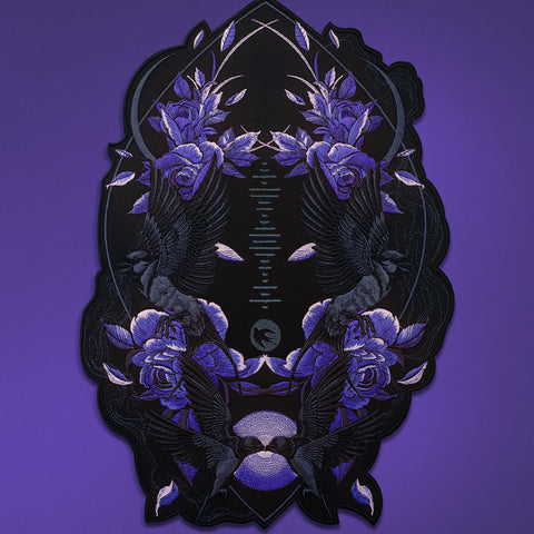 The Spotify Song Code Embroidered Patch features mirrored black birds and roses in purple and blue, with celestial accents on a dark background—ideal for personalizing your jacket or bag.